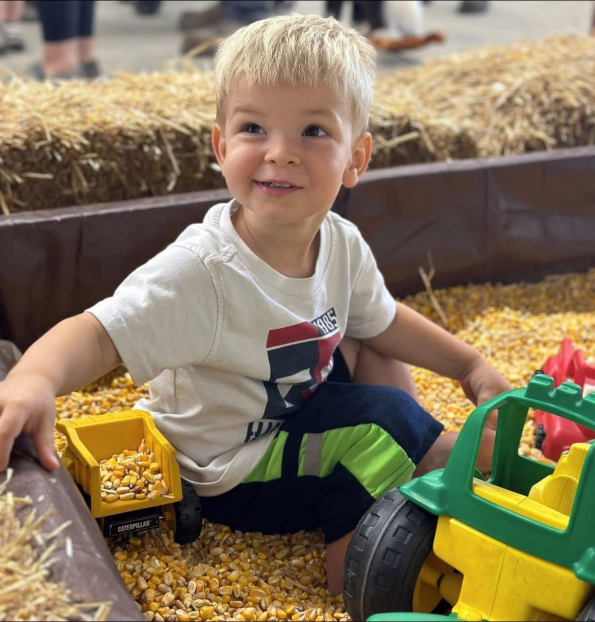 A young boy plays at the Howard County Fair