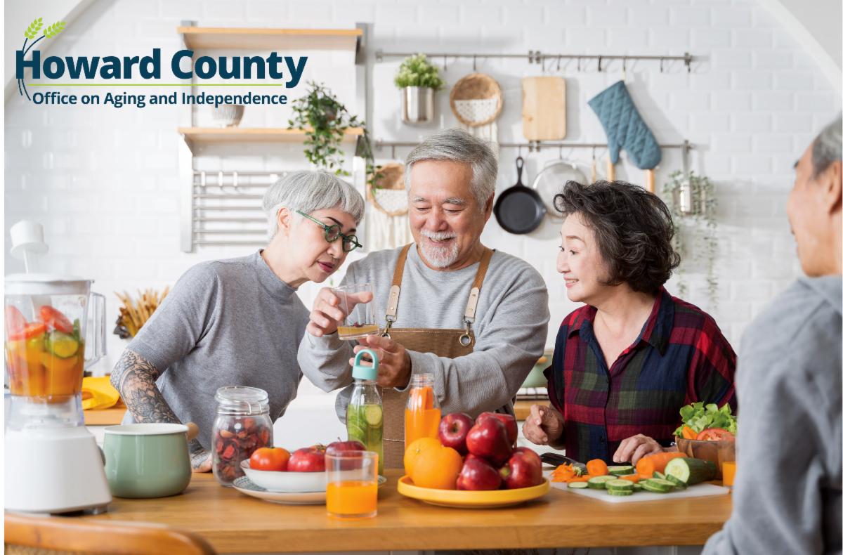 Older Asian adults cooking together. 