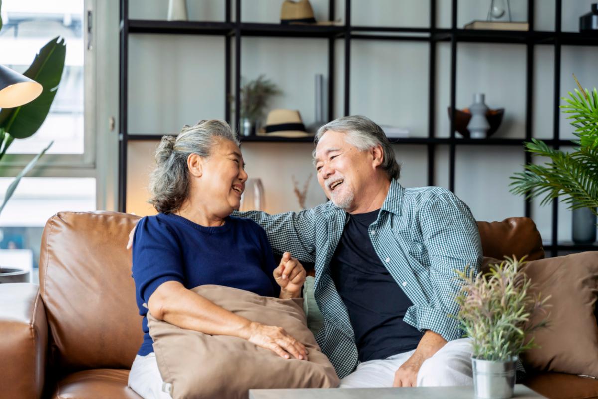 An older Asian couple in their home
