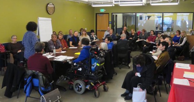 Shireen McSpadden talking to a group of Coalition members