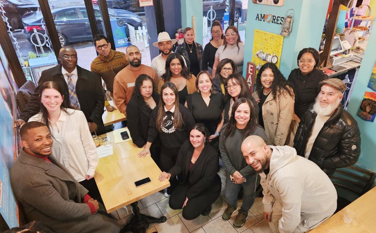 Group of people at a merchant organizing meeting in a small business