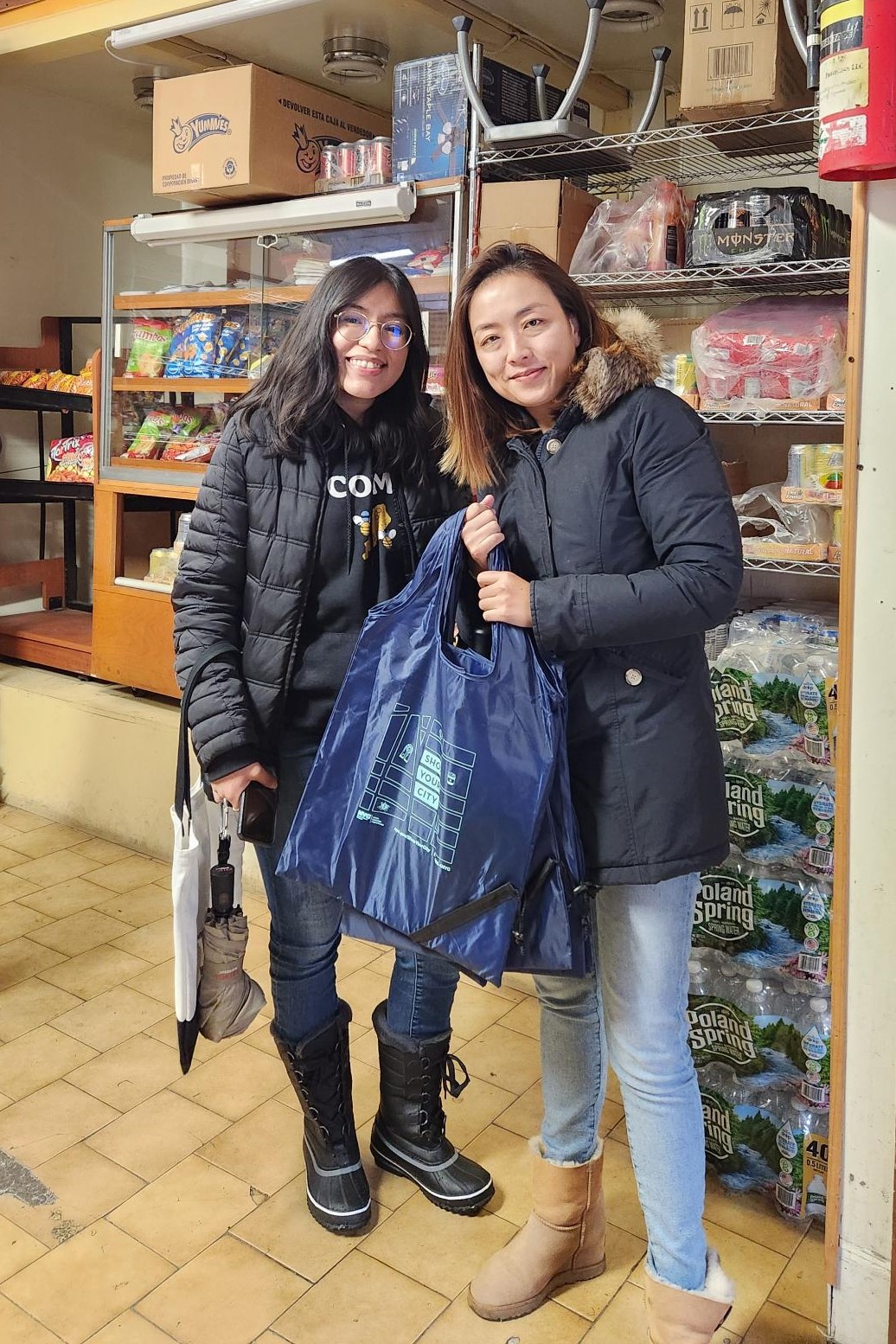 N Y C BEST staff with La Colmena staff at a business in Staten Island
