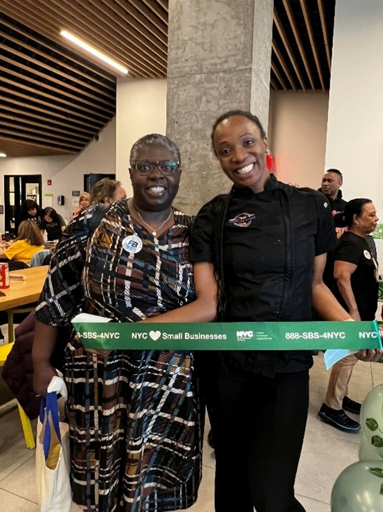 S B S Commissioner Dynishal Gross with owner Cherylle Lewis at grand opening of Rellâs Cafe Corner