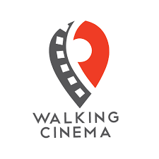 Red and gray upside down tear drop with a strip of film running along one side. Underneath the upside down tear drop in all capitals reads "Walking Cinema"