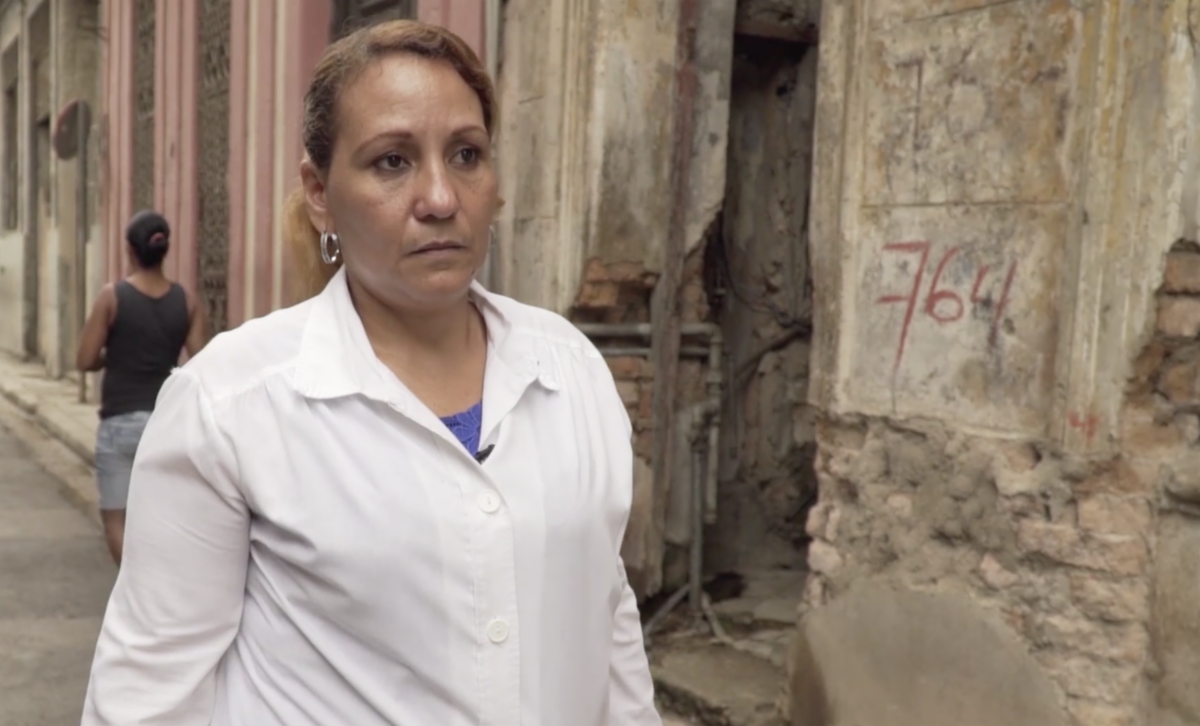 Image of woman on street from "Trump's War on Cuba"