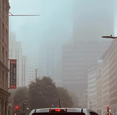 Photo of downtown Boston hidden by smog