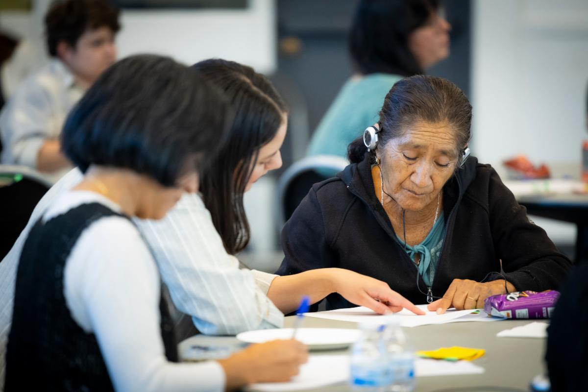 Technology & Innovation staff helping a Long Beach resident