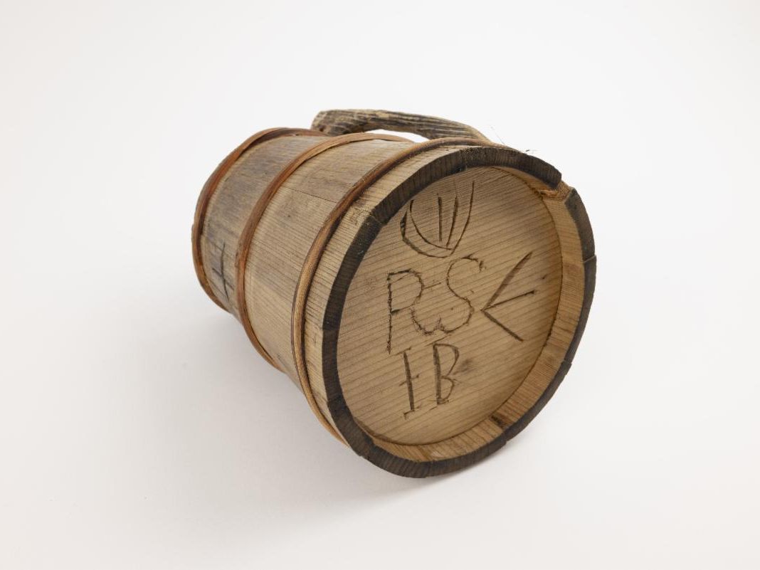 Wooden tankard from the shipwreck of the 'Defence'.
