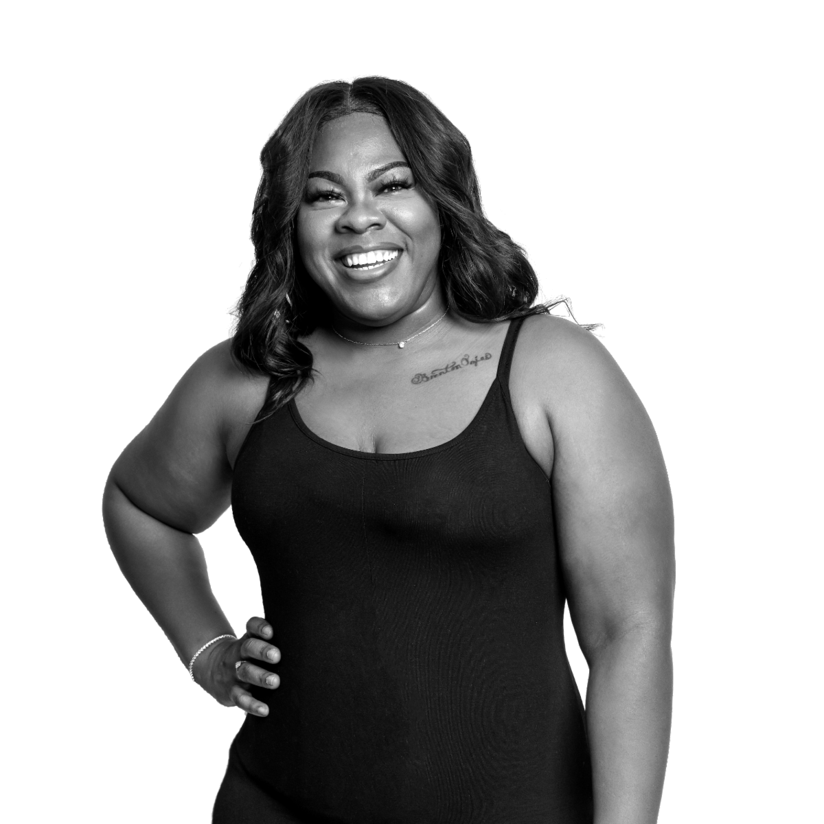 Photo of BRIANNA KNIGHT in a black shirt standing and smiling