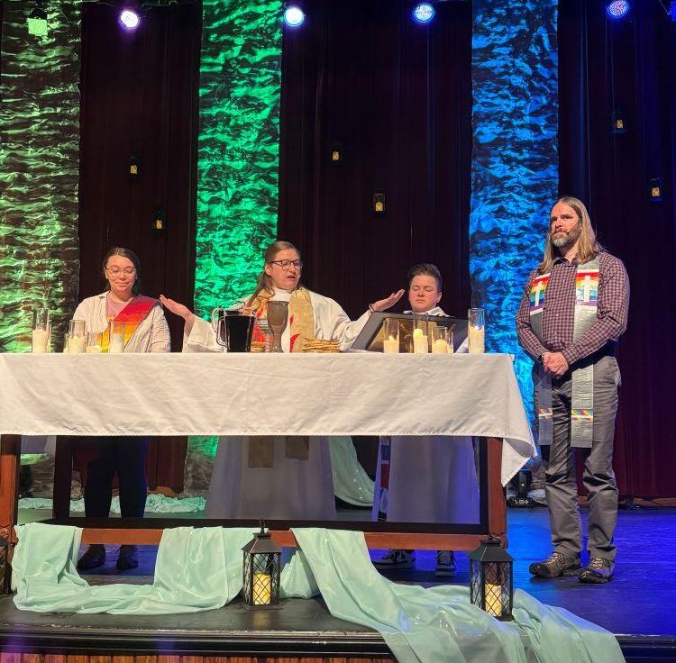 Sara from Claggett Center and Jess from ECCC presiding at the altar at closing Eucharist