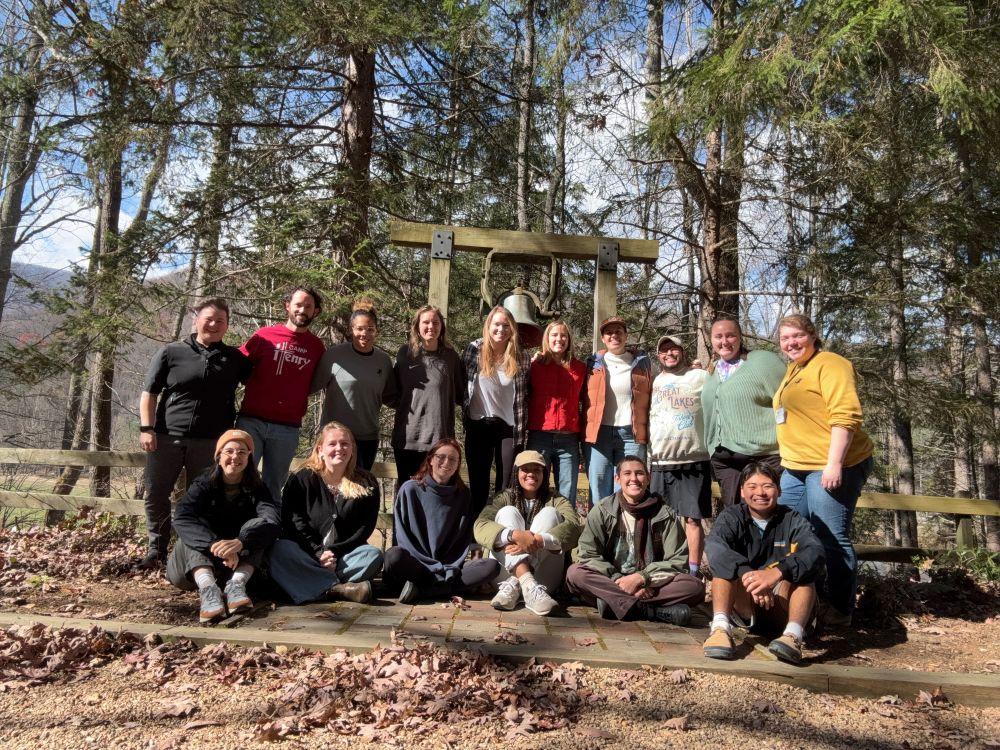 Group photo of the 18 participants at Program Summit at Lake Logan