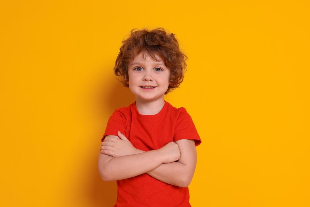 Child in orange shirt