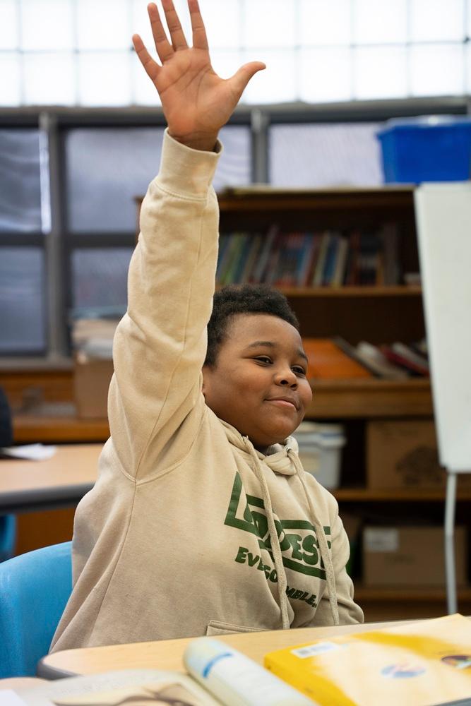 Student with hand up