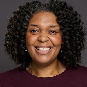 Raynell Washington black woman smiling
