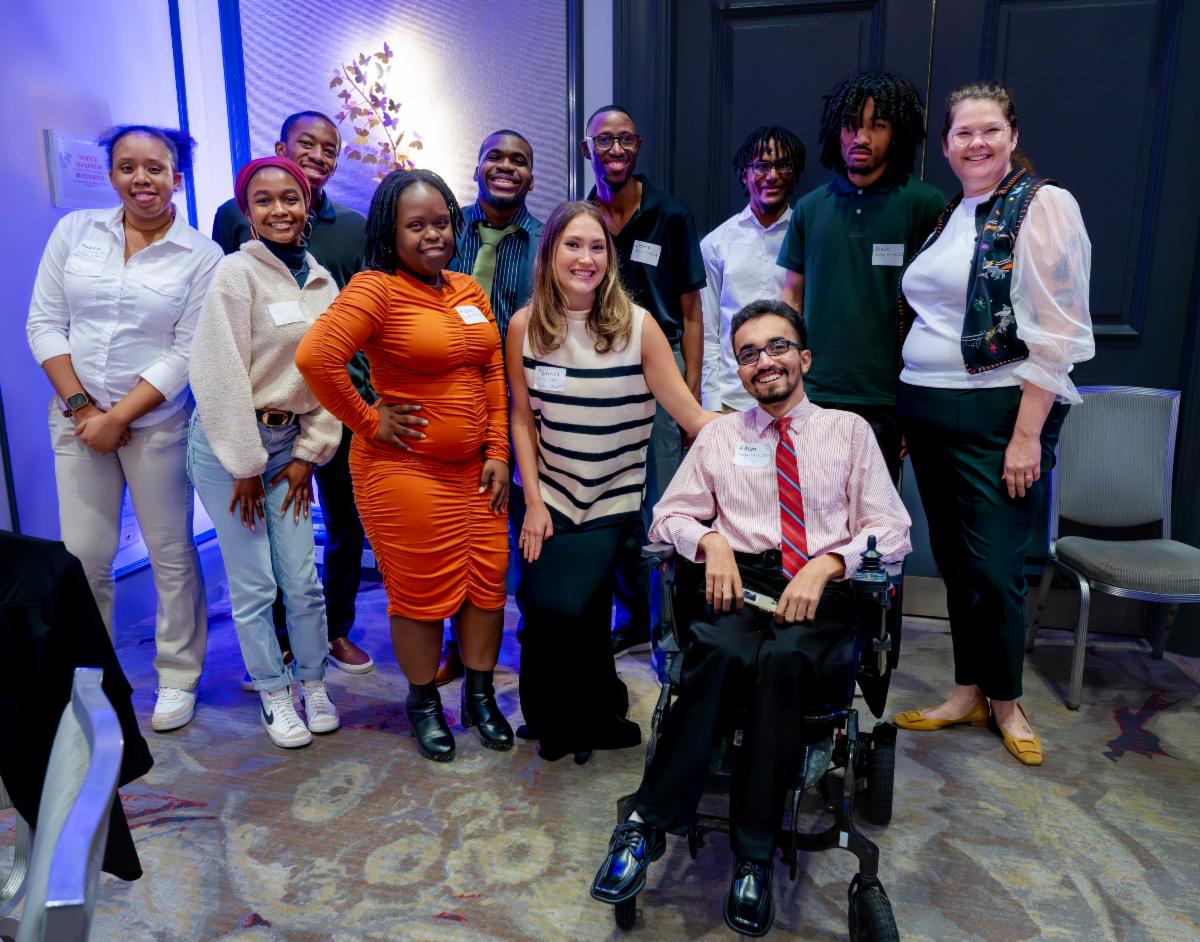 Group picture of IDEAL students and their director Spenser Norris