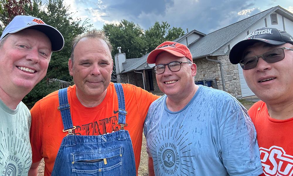 A rainy selfie of the Dean Team during the United Way Day of Caring.