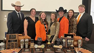 The 2025 National Reserve Champion Meat Judging Team poses with their awards.