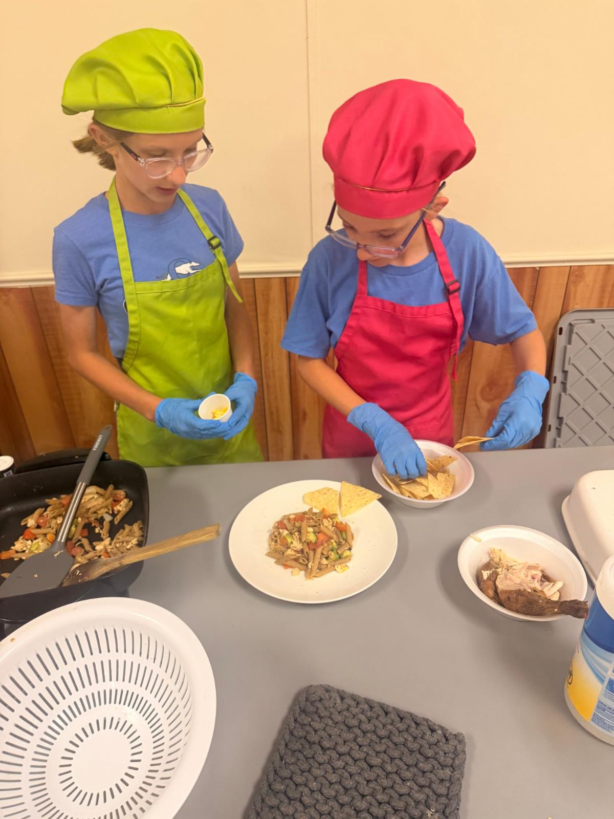 An image of two Blaine County 4-H Youth participating in the 2026 4-H Food Showdown.
