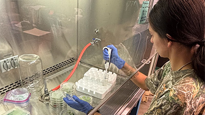 Samantha Buie in a horticulture lab.