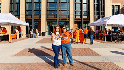 Ferguson College of Agriculture Alumni and Staff pose for a picture in front of the Ferguson College of Agriculture.