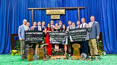 The 2025 National Champion Livestock Judging Team poses with their awards.