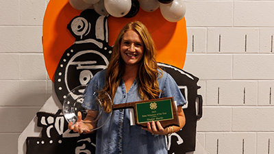 Taylar Burke with her State Volunteer of the Year award.