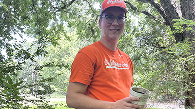 Jared Sauffley in a wooded area.