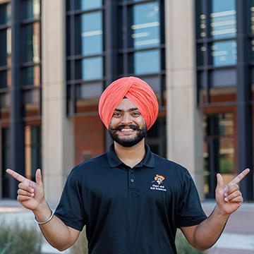 Harsanjam Singh portrait in front of Agricultural Hall.