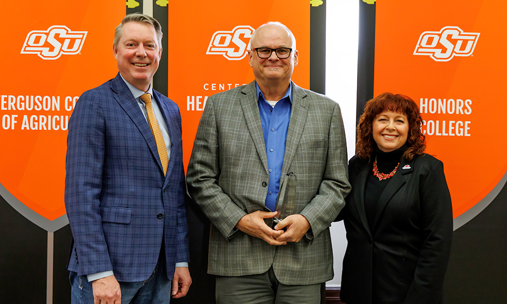 Jayson Lusk, Sam Fuhlendorf and Cynda Clary during the University Convocation Awards.