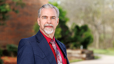 Portrait of Ron Cox.