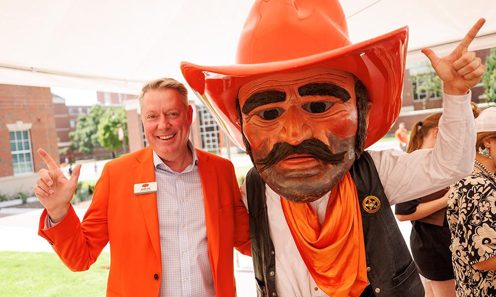 Dr. Jayson Lusk and Pistol Pete pose for a picture.