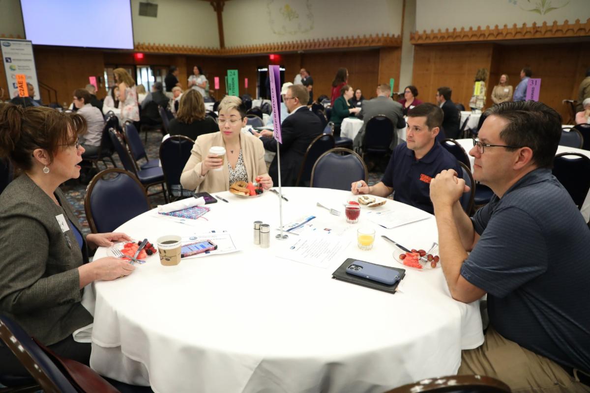 Networking at NLEA Symposium