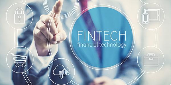 Man Selecting FinTech from computer screen