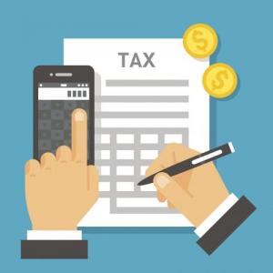 Illustration of hand filling out tax form.