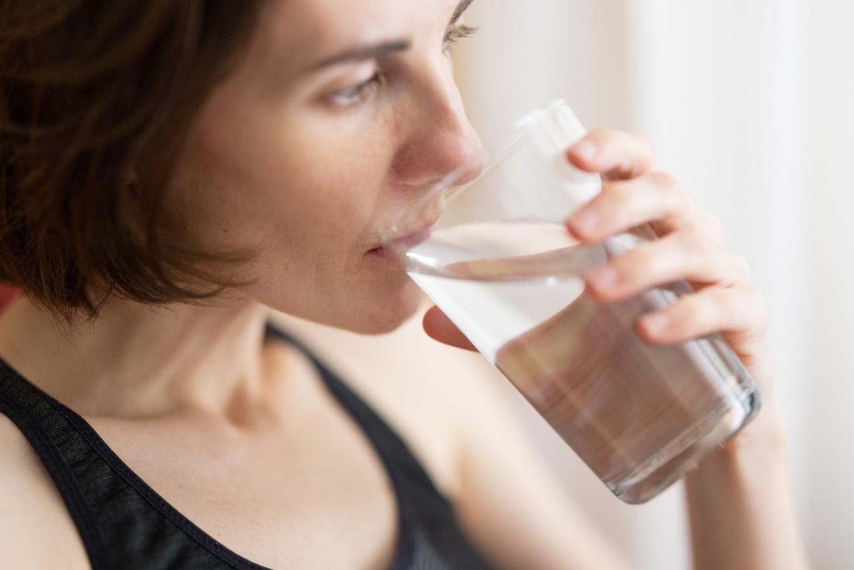 Woman drinking glass of water