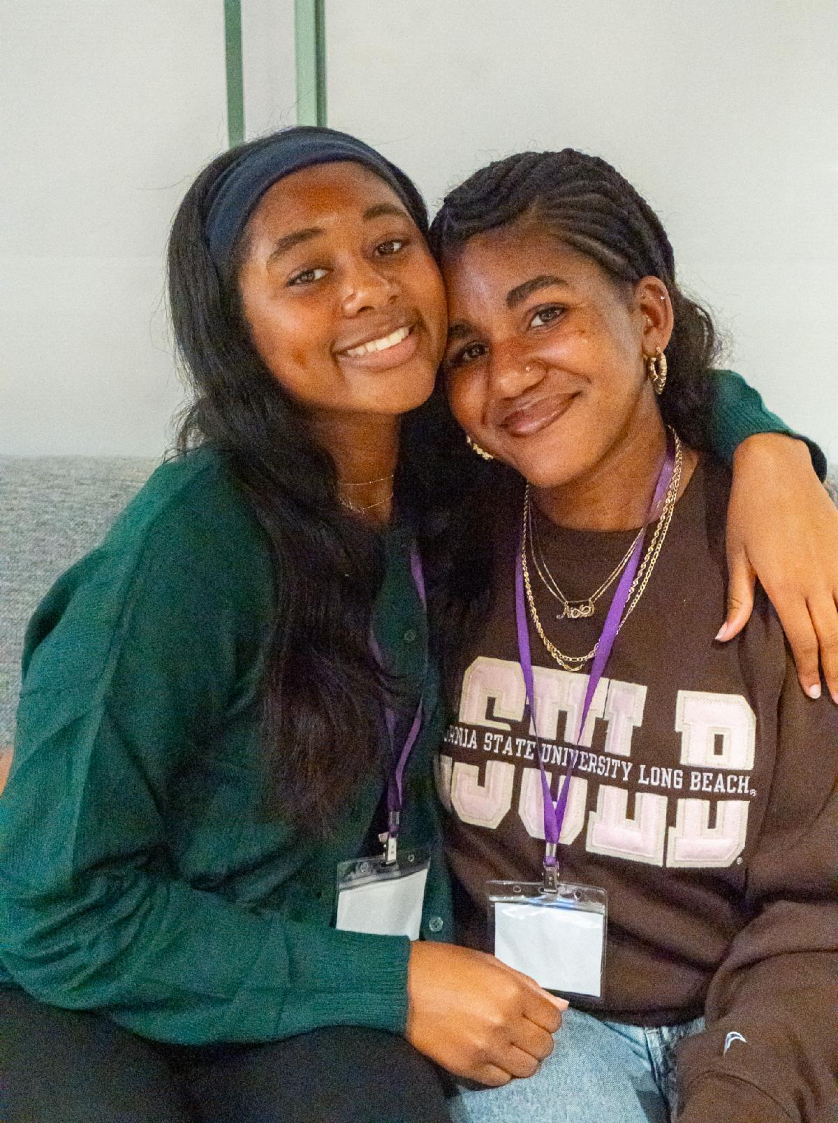 Nila and Toi depicting community 