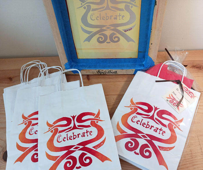 Gift bags and the screen they were printed from