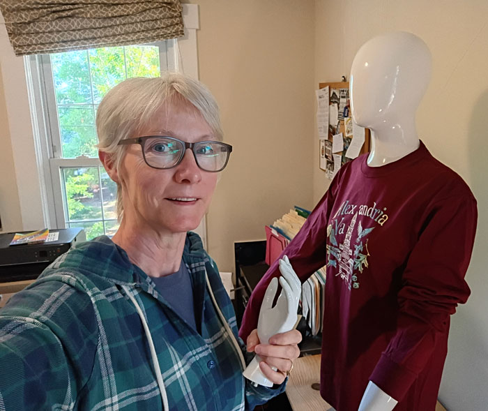 Getting the mannequin ready for a photo shoot
