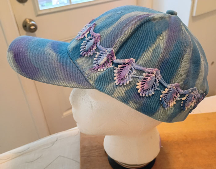 Dyed and painted lace cap