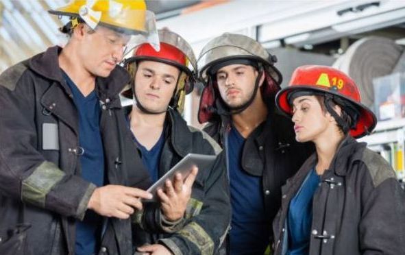 Firefighter on cell phone.JPG