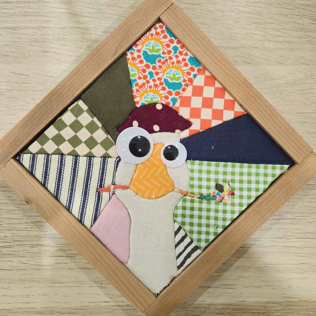 embroidered duck artwork