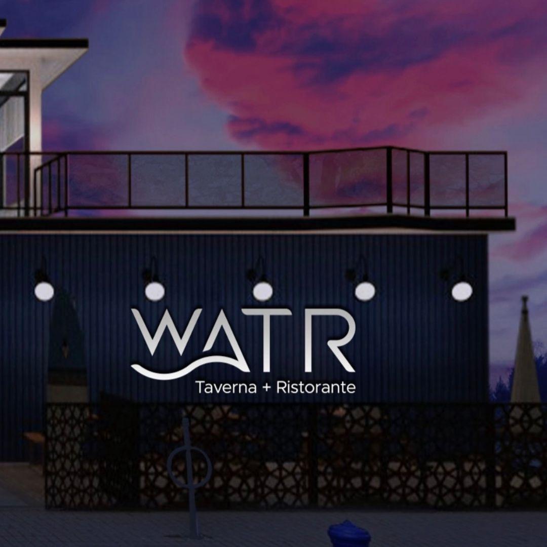 exterior of Watr restaurant at sunset
