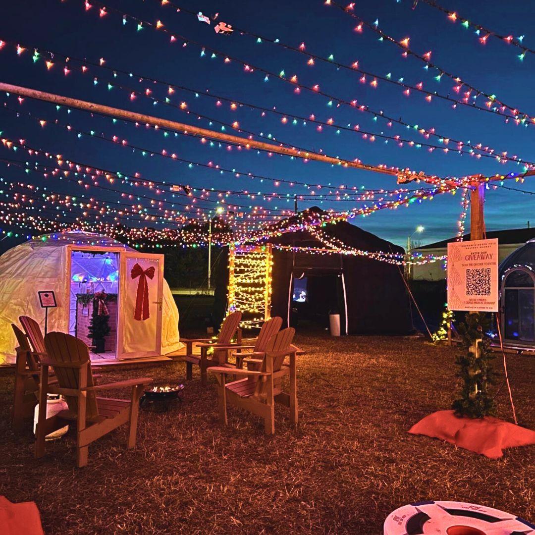 holiday market with domes and lights and tables