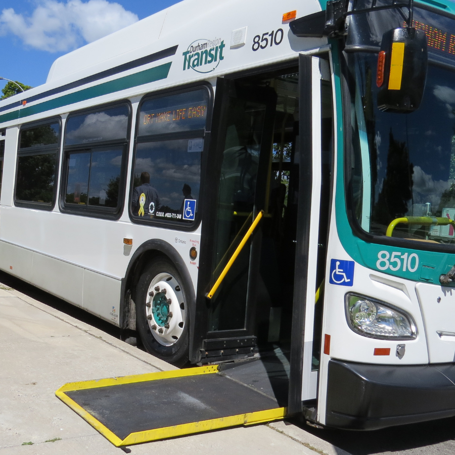 Durham Region Transit scheduled service bus with ramp lowered. 