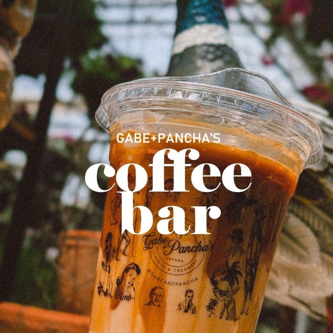 close up of an iced coffee in a greenhouse
