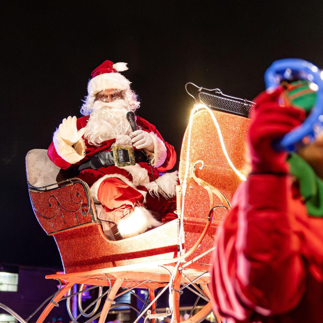 Santa on sleigh at parade