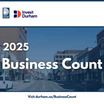 A photo of a downtown street with a navy blue filter. The Durham Region and Invest Durham logos are in the top left-hand corners. White text reads 2025 Business Count. On the bottom a white banner with navy blue text reads Visit durham.ca BusinessCount