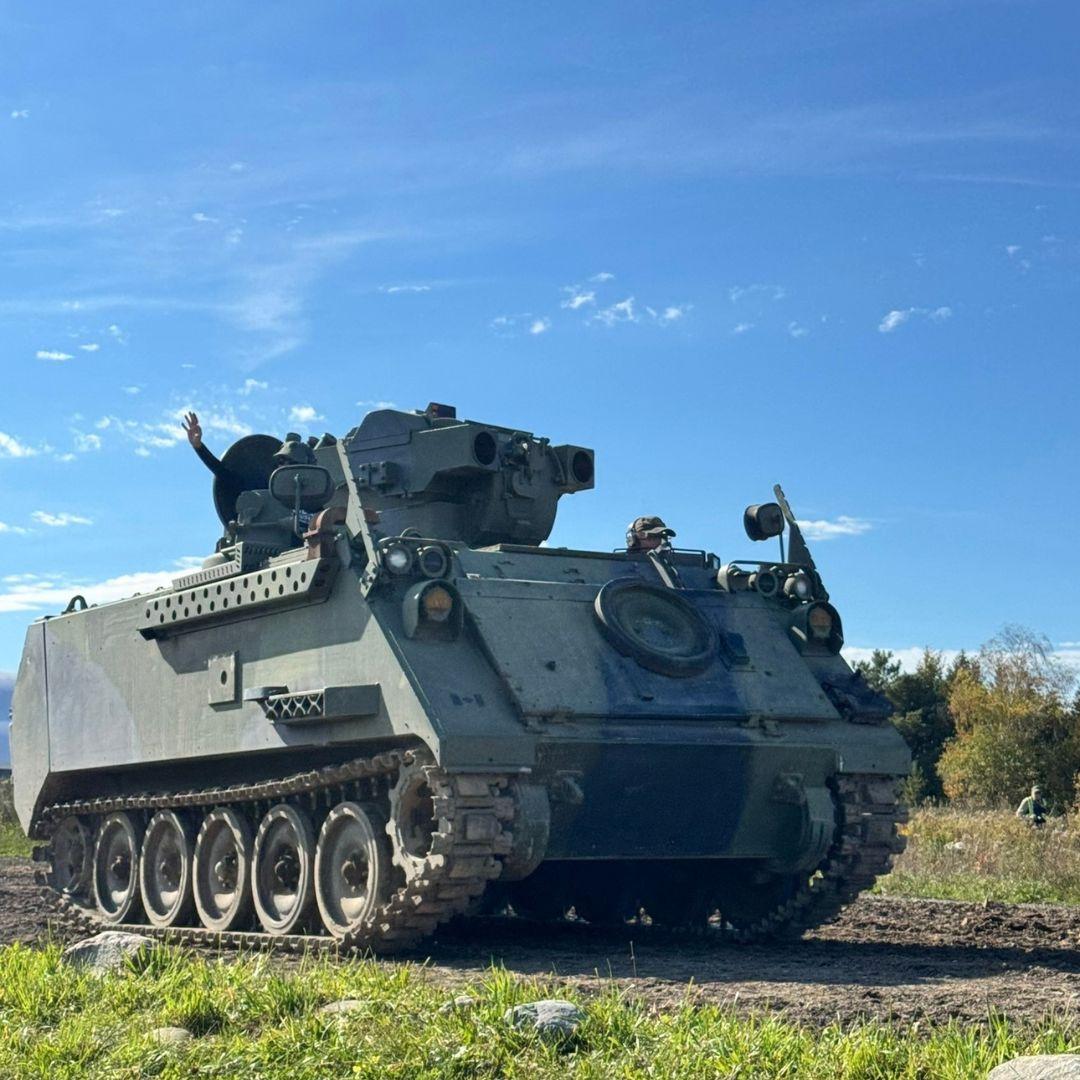 tank sits on a field
