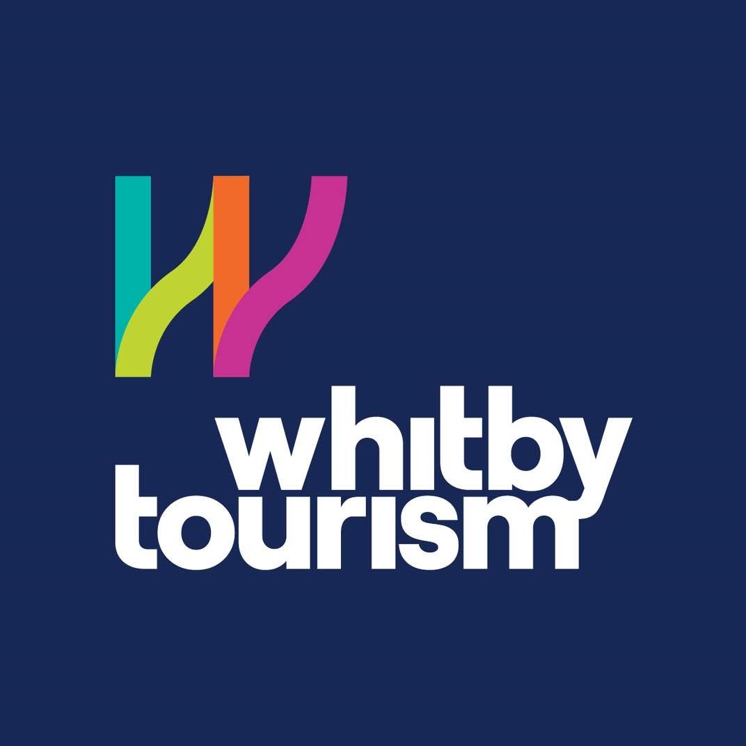 multi-coloured graphic W with text: Whitby tourism below
