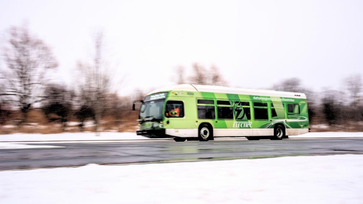 DRT bus driving on a snowy road
